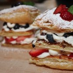 This Patriotic Berry "Napoleon" piles juicy seasonal berries and fluffy sweet cream onto golden puff pastry for a fabulous summer dessert! | dessert recipes | summer recipes | BearandBugEats.com