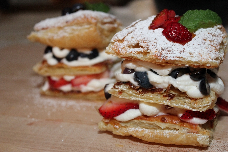 This Patriotic Berry "Napoleon" piles juicy seasonal berries and fluffy sweet cream onto golden puff pastry for a fabulous summer dessert! | dessert recipes | summer recipes | BearandBugEats.com