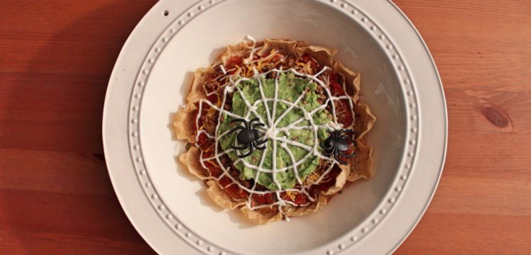 Spidery 5 Layer Nacho Dip! An easy, fun, feeds-crowds recipe for your next Halloween Party! | BearandBugEats.com